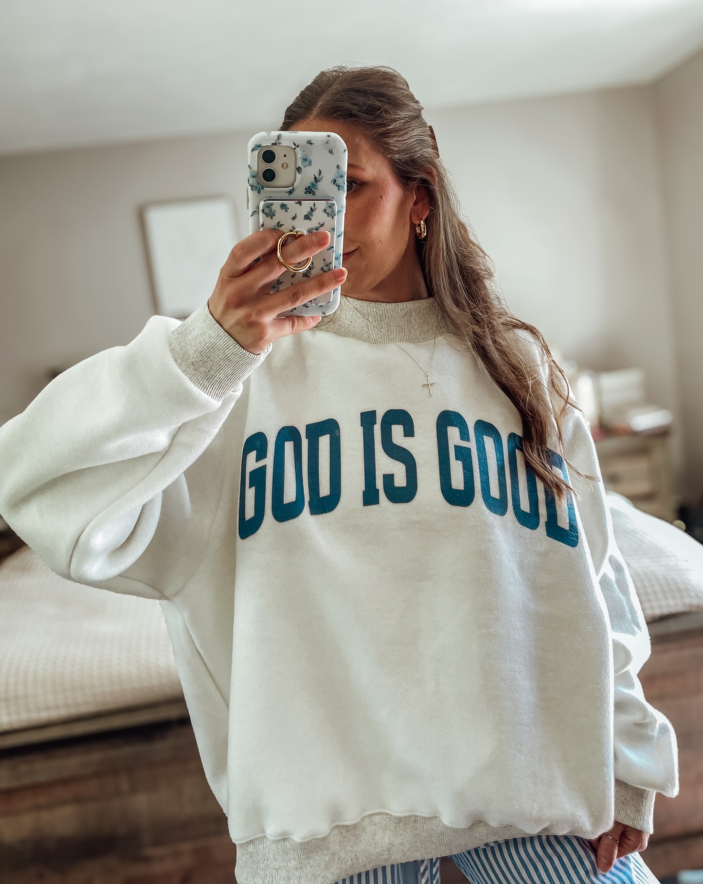 ‘Jesus & God is good’ reversible mockneck sweater