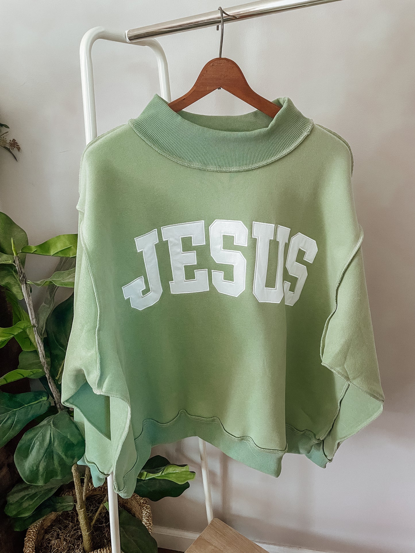 Sage 'Jesus’ mock neck sweater