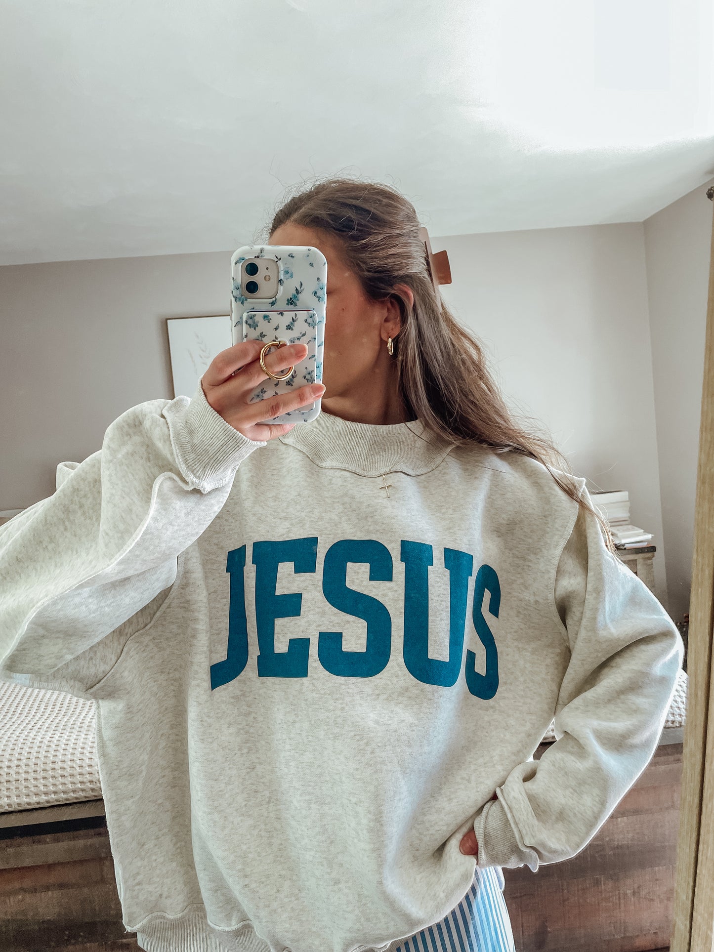 ‘Jesus & God is good’ reversible mockneck sweater